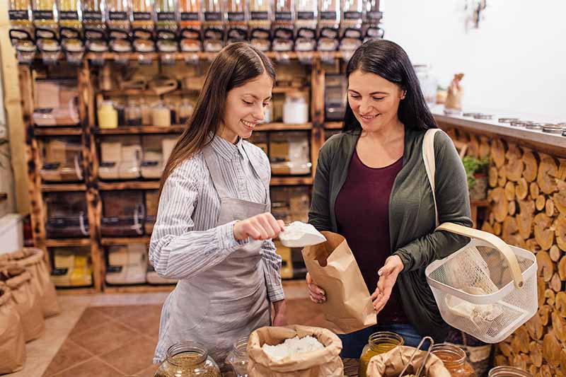 Horizontal image of buying fresh ingredients at a store.