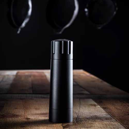 Image of the Mannkitchen Pepper Cannon on a wooden table.