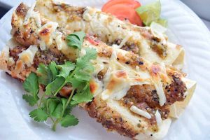 Creamy Chicken Enchiladas Verdes with Charred Tomatillo Sauce