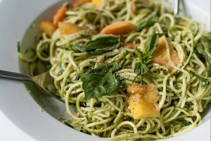 Zucchini Spaghetti with Peaches and Pumpkin Seed Pesto